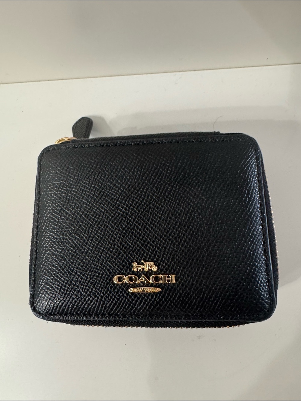 Like New Coach Black Textured Leather Zip-Around Case with Gold Emblem